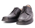 Black glossy manÃ¢â¬â¢s shoes with shoelaces